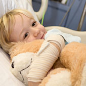 Child in hospital with bear