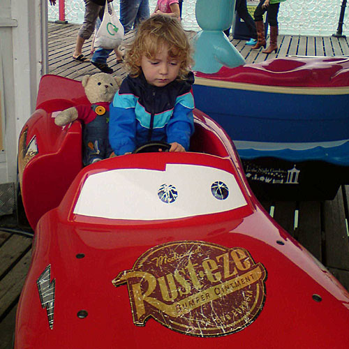 Jimmy and teddy at the funfair